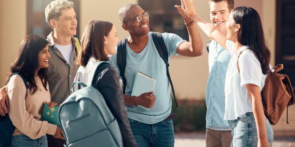 University, friends and student high five of diversity, college and education group outdoor. Students, study and success support hand gesture of people with happiness excited about learning goal.